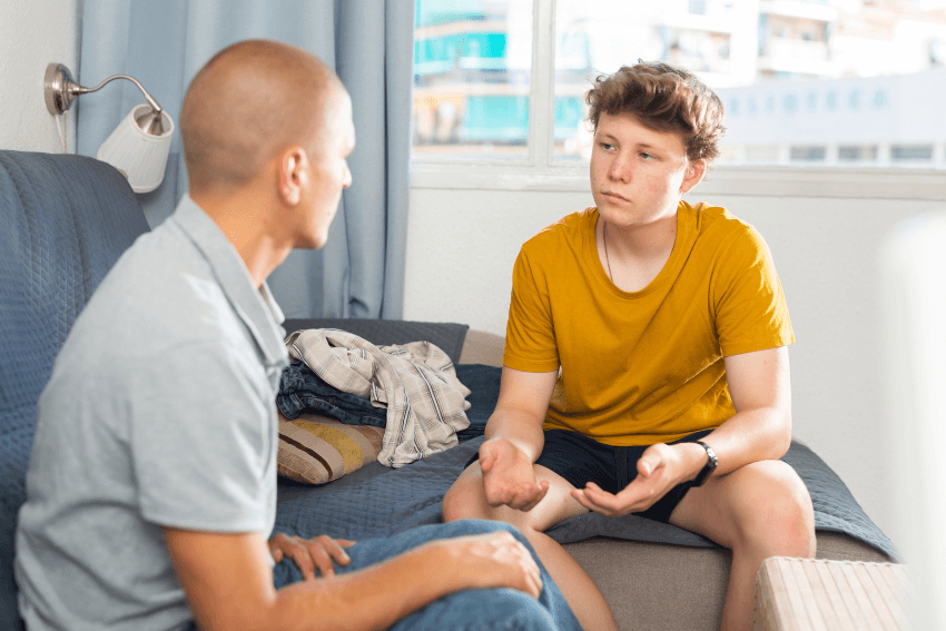 two men having a deep conversation