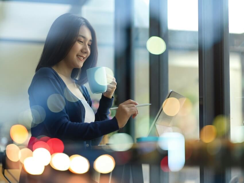 woman learning something on a tablet