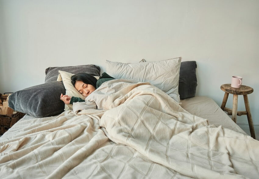 woman sleeping in bed