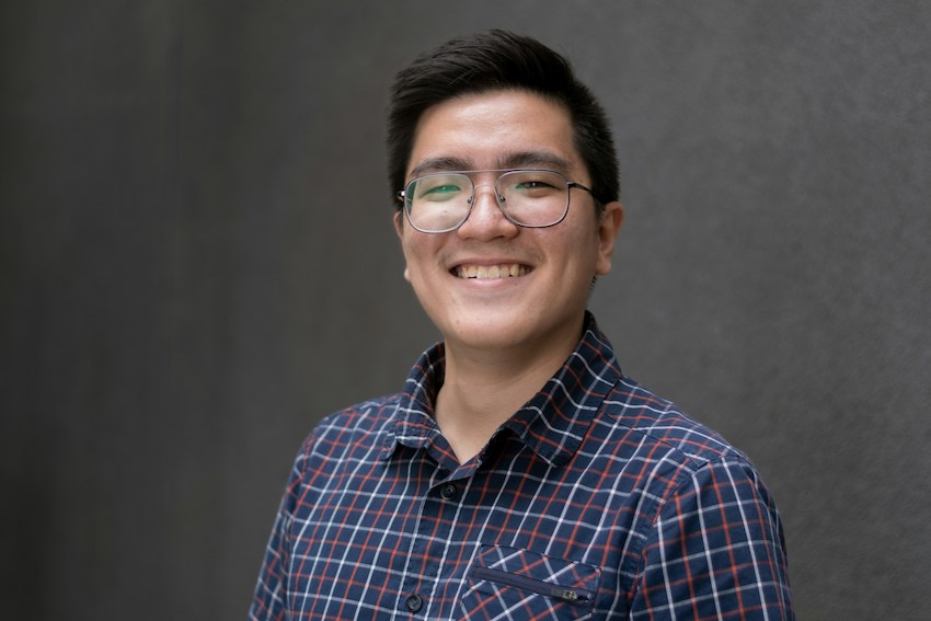 man smiling directly at someone