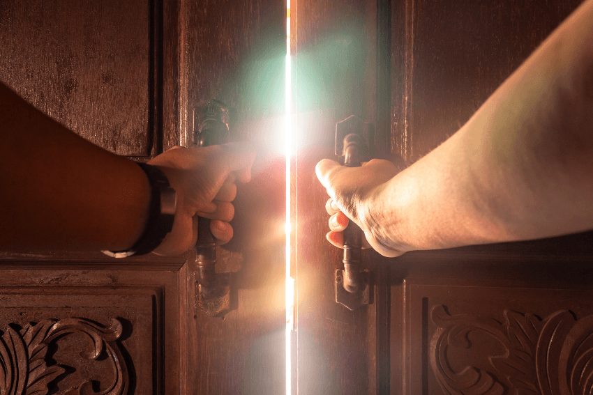 person opening a door