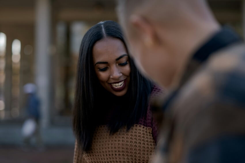 woman smiling with gratitude for something her friend did